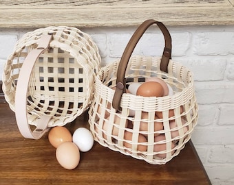 Natural Rattan Hand woven Egg Storage Basket with Genuine Leather Handle. Flower Basket. Modern decor