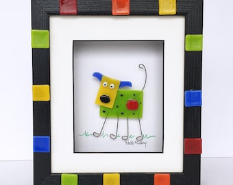 Whimsical bright fused glass dog picture in shadowbox frame with stainless steel legs and tail