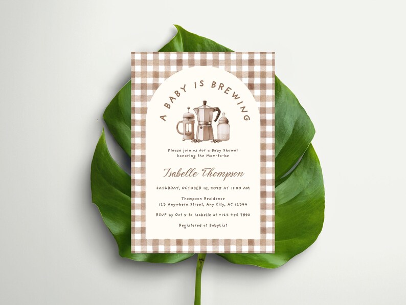 May include: A baby shower invitation with a brown and white gingham border. The invitation features the text "A Baby is Brewing" above illustrations of a coffee pot, a French press, and a baby bottle. The invitation includes the name Isabelle Thompson, date, time, and location.