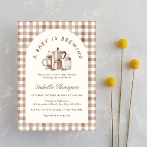 May include: Baby shower invitation with a brown and white gingham pattern background. The invitation features the text "A Baby is Brewing" and details for the event, including the date, time, and location. Yellow flowers are on the right.