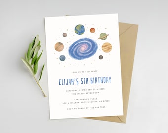 May include: A birthday invitation with a space theme. The invitation features a watercolor illustration of planets and a galaxy. The text reads "Elijah's 5th Birthday" with event details. Includes a kraft paper envelope and a sprig of greenery.