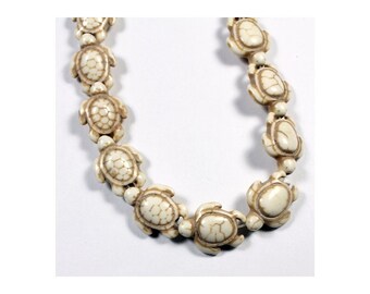 Howlite Turquoise Turtle Beads by the Strand - White