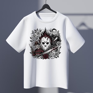 May include: A white short-sleeve t-shirt featuring a graphic print of a hockey mask, a character in a striped sweater with a clawed glove, and a character in a dark jumpsuit holding a knife, all surrounded by dark roses and thorny vines.