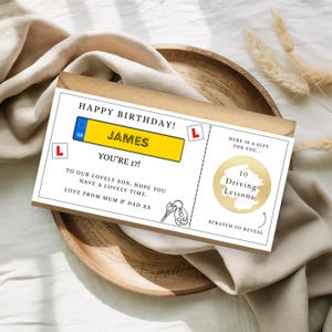 May include: A birthday gift card with the text "HAPPY BIRTHDAY! JAMES YOU'RE 17!" and a UK license plate design. The card includes a scratch-off area for 10 driving lessons, with a key and car graphic.