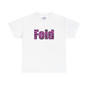 May include: White t-shirt with the word "Foid" in a bold, black font with a pink zebra print fill. The shirt has a crew neck and short sleeves. A small star logo is visible near the neckline.