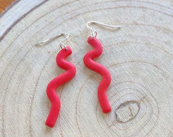 Red Squiggle drop earrings on silver ear wire, bright lightweight polymer clay