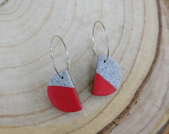 Half moon polymer clay earrings on hoop, red side of the moon