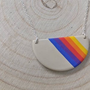 Bright polymer clay statement necklace on silver chain, cream with retro rainbow | Handmade Lightweight Jewellery