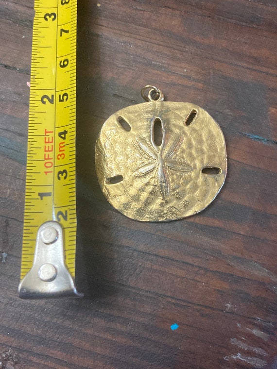 Vintage sand dollar gold plated pendant