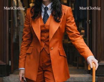 May include: An orange three-piece suit with a matching handbag and umbrella. The suit includes a blazer, vest, and trousers. The text "MariClothig" is displayed above the entrance.