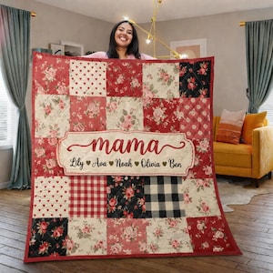 May include: A patchwork quilt with a red border and a variety of patterns, including hearts, floral prints, and gingham. The quilt features the word "mama" in a decorative font, along with the names Lily, Ava, Noah, Olivia, and Ben.