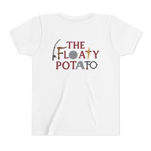 May include: White t-shirt featuring the text "THE FLOATY POTATO" in maroon and grey. The design includes a fishing rod, a potato with a face, a lightning bolt, and other graphic elements. A casual, fun design.