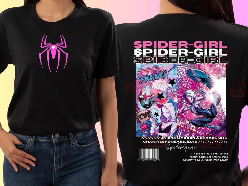 May include: Black t-shirt with a pink spider logo on the front. The back has a comic-style Spider-Girl graphic with "SPIDER-GIRL" text and "MARVEL". The shirt includes Spanish text and a barcode.