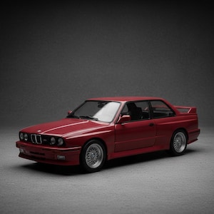 BMW M3 E30 Evolution bleu nuit (Minichamps) 1/18e