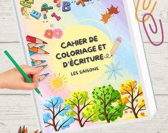 Può includere: Un libro da colorare e scrivere per bambini intitolato "Cahier de Coloriage et d'Écriture Les Saisons" con illustrazioni di alberi che rappresentano le stagioni. Include una mano che tiene una matita verde, matite colorate e pastelli.