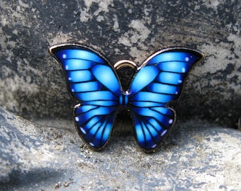 4 Blue and Black Butterfly Charms - C3486