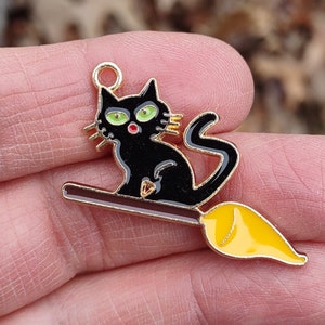 4 Witches Black Cat flying a Broom Charms Pandants with golden tone backing - C3740