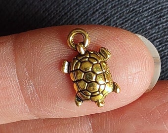 10 Small Gold Tone Turtle Charms - C2037