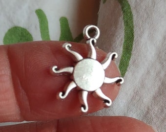 10 Sun Charms  in Silver Tone - C3998