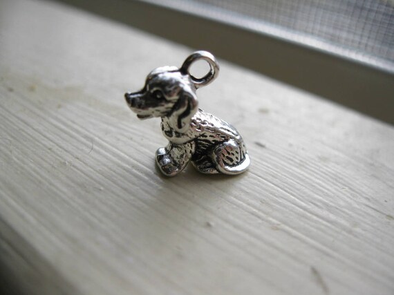 8 Dog charms silver plated A784