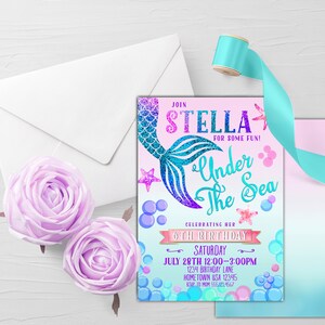May include: A mermaid-themed birthday party invitation with a glittery purple and blue mermaid tail, a pink background, and the text "Join Stella for some fun! Under the Sea Celebrating her 6th Birthday Saturday July 28th 12:00-3:00PM 1234 Birthday Lane Hometown USA 12345"