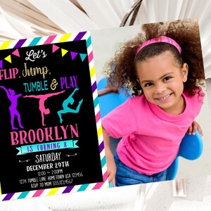 May include: A colorful invitation for a gymnastics-themed birthday party. The invitation features a black chalkboard background with the text "Let's FLIP, Jump, TUMBLE & PLAY" in colorful letters. The invitation also includes a photo of a young girl with curly hair wearing a pink shirt and a pink headband. The text "BROOKLYN IS TURNING 8" is written in pink and white letters. The invitation includes the date, time, and location of the party.