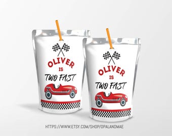 May include: Two red and white juice box labels with a checkered pattern. The labels feature a red race car, checkered flags, and the text "Oliver is Two Fast".