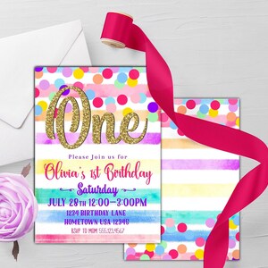 May include: A colorful birthday invitation with a gold glitter "One" and a watercolor background. The invitation says "Please join us for Olivia's 1st Birthday - Saturday - JULY 28TH 12:00-3:00PM - 1234 Birthday Lane - Hometown USA 12345 - RSVP to Mom 555.123.4567"