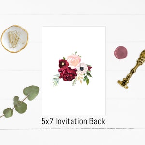 May include: A white 5x7 invitation back with a watercolor floral design in shades of burgundy, pink, and white. The floral design features roses, anemones, and greenery.