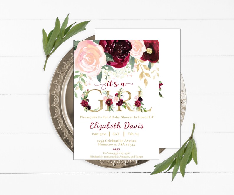 May include: A baby shower invitation with a floral design in shades of pink, red, and gold. The text reads "it's a girl" in gold lettering and includes the name "Elizabeth Davis" and details for the event.