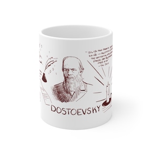 May include: White ceramic mug featuring a brown sketch of the author Dostoevsky, a quote, and the author's name. The mug has a simple design with illustrations of a quill, a candle, and other elements. A literary-themed gift.