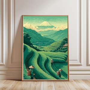 Puede incluir: Una lámina de arte enmarcada que representa un paisaje verde con campos de té en terrazas, tres figuras con sombreros cónicos y cestas tejidas, y un pico de montaña nevado a lo lejos bajo un cielo de color verde claro.