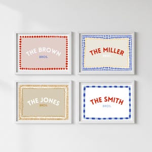 May include: Four framed family name prints. Each print features a different name: "The Brown Bros.", "The Miller Bros.", "The Jones Bros.", and "The Smith Bros.". Each print has a unique border design and color scheme, with text in a bold, playful font.