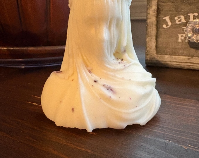veiled woman candle