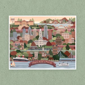 May include: A colorful illustrated print of the Philadelphia skyline featuring various city buildings, a bridge, a ship, and a sailboat on the water. A dark red banner at the bottom displays the text PHILADELPHIA in white capital letters.