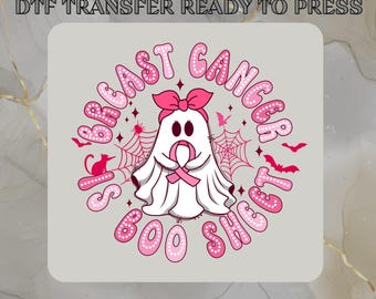 May include: A DTF transfer featuring a cartoon ghost with a pink ribbon, surrounded by the words "Breast Cancer Fights Boo Show" in pink bubble letters. Includes bats, spiderwebs, and a cat silhouette.