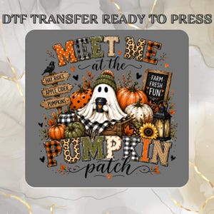 May include: A DTF transfer ready to press featuring a ghost wearing a green beanie and holding a coffee cup. The design includes pumpkins, a lantern, a sunflower, and signs reading Hay Rides, Apple Cider, Pumpkins, and Farm Fresh Fun.
