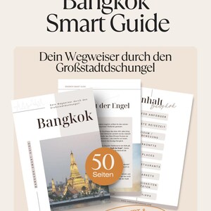 May include: A stack of travel guides titled "Bangkok Smart Guide." The cover of the main guide features a photo of a temple. The guides include the text "50 Seiten" and "INKL. MRT & SKYTRAIN PLAN + THAILAND PACKLISTE."