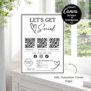 May include: A black and white sign with the text "LET'S GET Social" and social media QR codes. The sign includes the text "LIKE | FOLLOW I TAG" and a space for a logo. The sign also includes the text "Edit. Customize. Create Magic."
