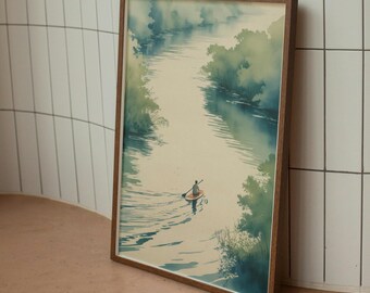 May include: Watercolor print of a river scene with a person paddleboarding. The artwork features a serene river flowing between lush green trees. The person is on a small orange paddleboard. The artwork is framed in a brown wooden frame.