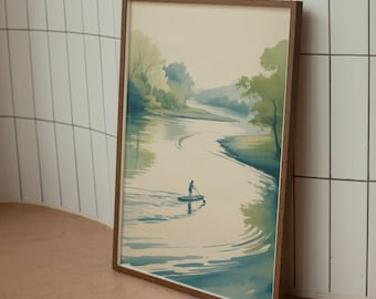 May include: Watercolor print of a river scene with a person paddleboarding. The artwork features a person on a paddleboard in the center of the river, surrounded by trees and a soft, muted color palette. The print is framed in a brown wooden frame.