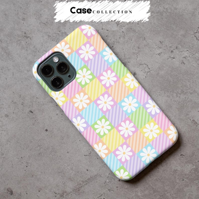 May include: A pastel phone case with a daisy and checkerboard pattern. The case has a repeating design of white daisies on a grid of pastel squares and stripes. The text "Case Collection" is at the top.