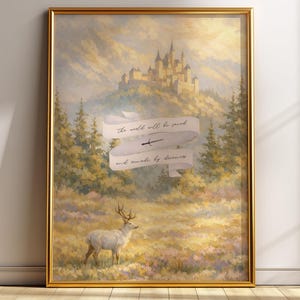 May include: A framed landscape painting with a gold frame. The artwork depicts a castle on a hill, a deer in a field, and a banner with text. The color palette includes greens, yellows, and browns, creating a warm and inviting scene.
