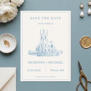 May include: A wedding invitation with a blue church illustration and text that reads "Save the Date" for McKenna and Michael, with the date 01.01.2026 and location Boston, MA. The invitation is surrounded by white roses, earrings, and a gold wax seal.