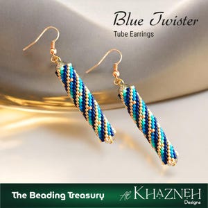 May include: Two tube earrings with a blue and teal beaded pattern. The earrings are described as "Blue Twister Tube Earrings" and have gold-coloured hooks. The image also displays the text "The Beading Treasury" and "Al Khazneh Designs."