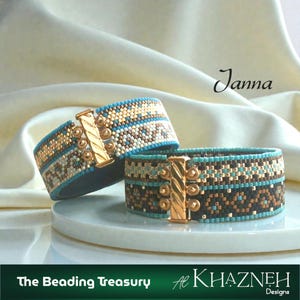 May include: Two beaded cuff bracelets with gold clasps. One bracelet features a pattern of gold, blue, and white beads, while the other has a pattern of black, teal, and gold beads. The bracelets are displayed on a white surface with a soft, cream-coloured background.