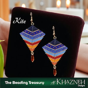 May include: A pair of handmade beaded earrings in a kite shape. The earrings feature a geometric design with navy blue, light blue, red, and orange beads. Each earring has a teardrop-shaped amber bead pendant. The word "Kite" is written in cursive.