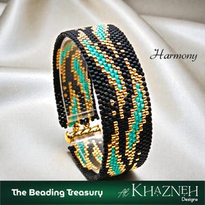 May include: A black beaded bracelet with turquoise and gold geometric designs. The bracelet has a gold clasp. The word "Harmony" is written on the image. The text "The Beading Treasury" and "Al Khazneh Designs" are also present.