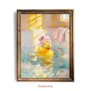 May include: A framed oil painting depicting a yellow rubber duck in a bathtub filled with blue water and bubbles. The duck wears a pink towel wrapped around its head and two cucumber slices over its eyes. A pink towel hangs on the tub edge.
