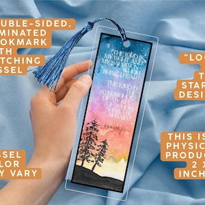 May include: Double-sided, laminated bookmark with a matching blue tassel. The bookmark features a watercolor design with text from Psalm 27:1. The bookmark measures 2 x 6 inches.